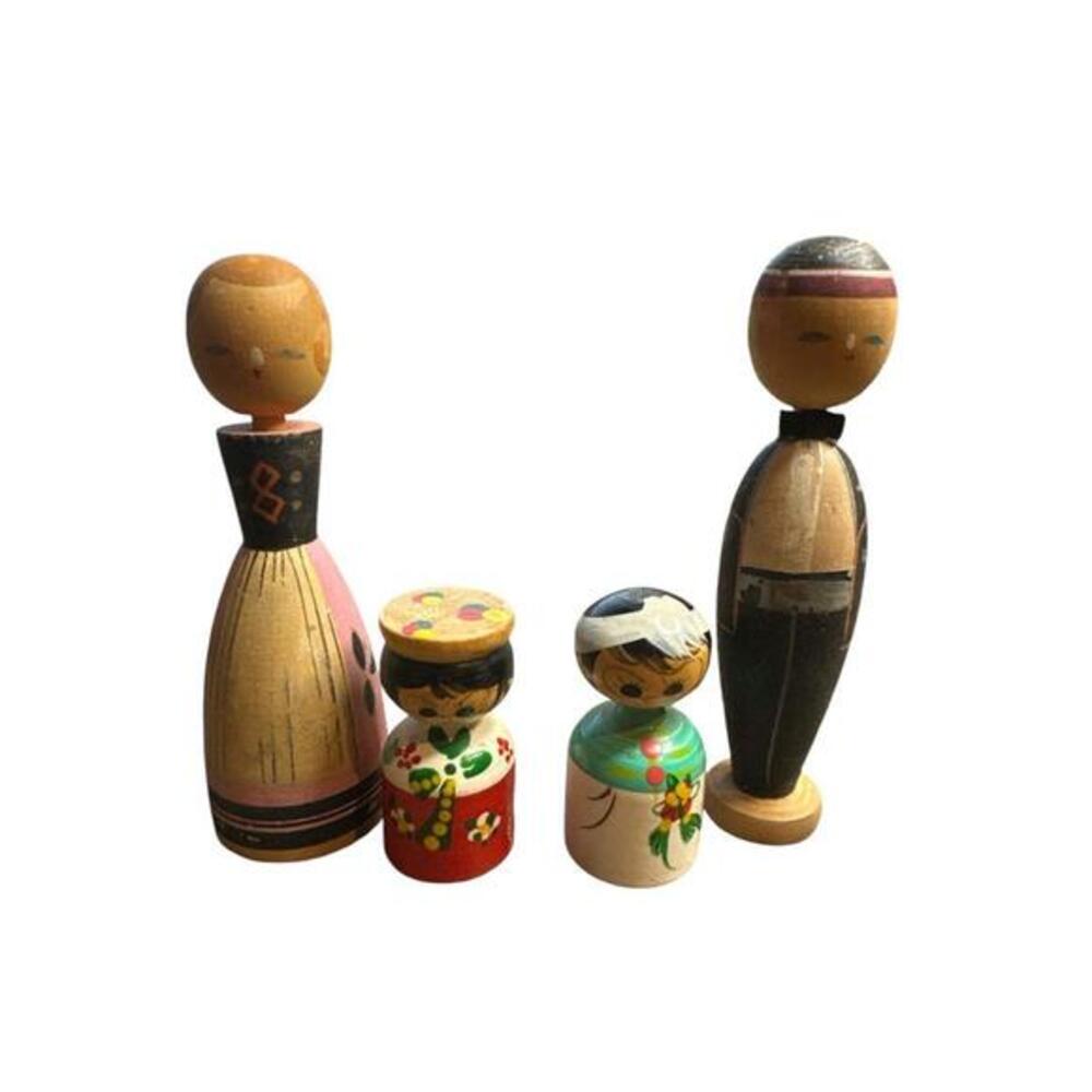 Vintage wood dolls size range from 4” to 2”